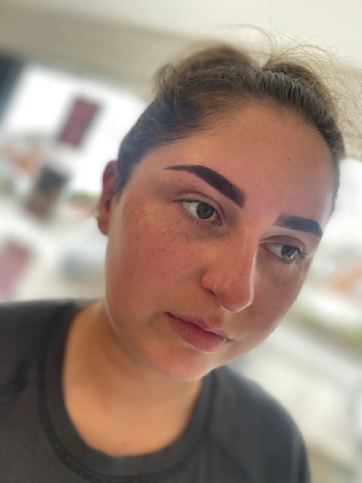 Laminated brows once settled, brushed up with a defined shape