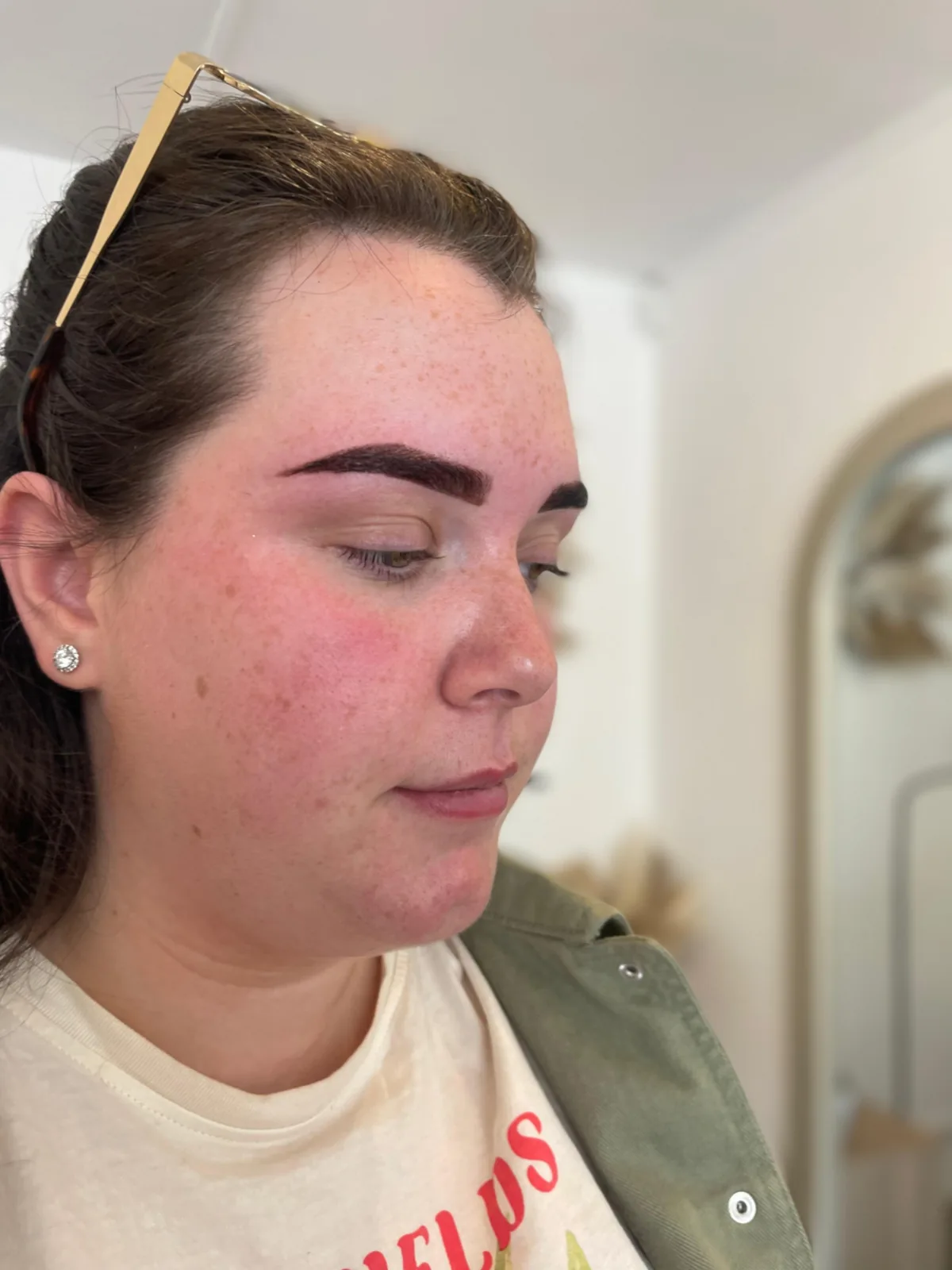 Laminated brows shown in profile, immediately after treatment